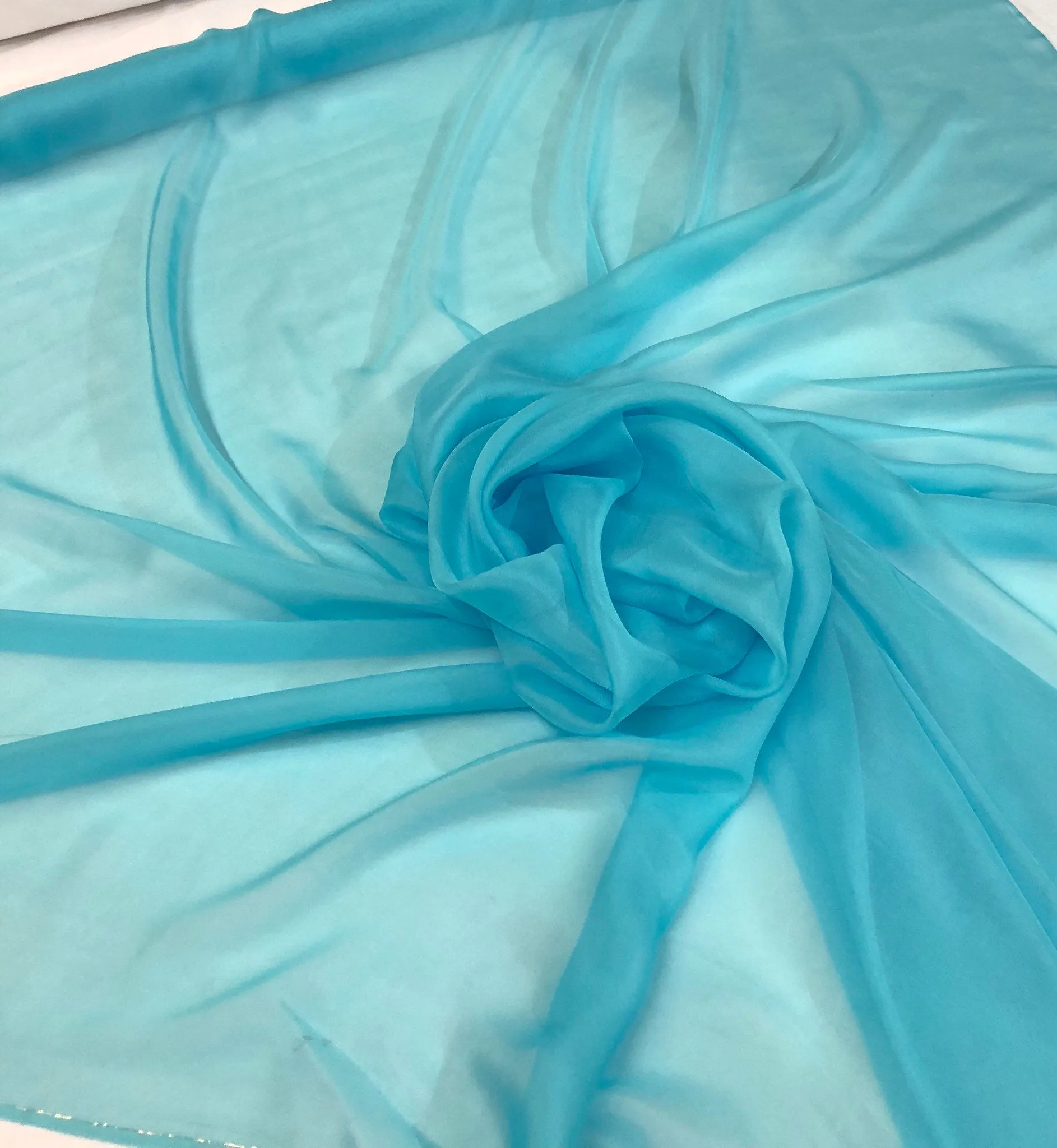 Silk chiffon 54&quot; wide    Beautiful aqua blue color silk french chiffon fabric sold by the yard